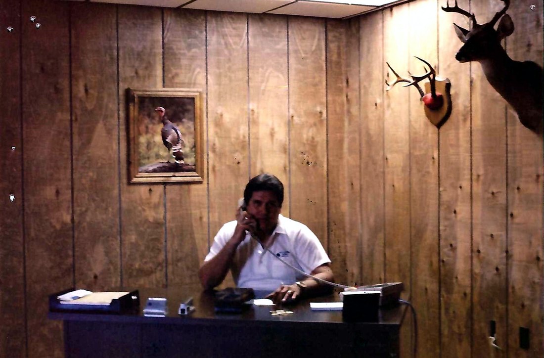 Founder Mark Rogers at his desk in the original West Central Florida Heating and Air Conditioning office